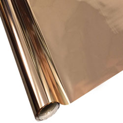A rolled up piece of rose gold StarCraft Electra Foil, showing a close-up of the reflective surface.