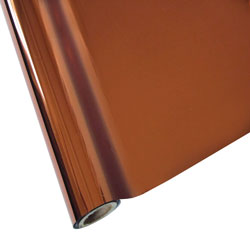 A roll of bronze-colored StarCraft Electra Foil, used for heat transfer printing in crafting.