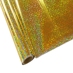 A close-up of a rolled-up piece of StarCraft Electra Foil, displaying a holographic gold sequins pattern.