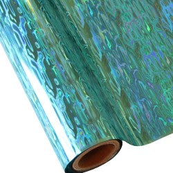 A roll of waterfall StarCraft Electra Foil in green, showing a close-up of the holographic pattern.